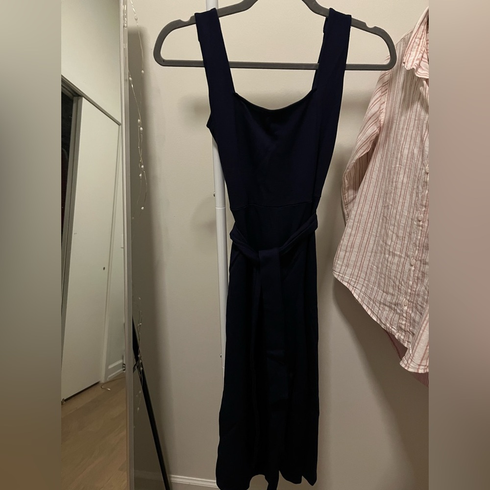 navy jumpsuit that comes with a belt to cinch your waist